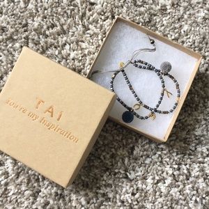 TAI adjustable bracelet with charms